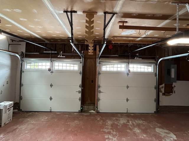 New white garage doors in Point Pleasant NJ during winter
